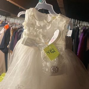 #482 girls dress white bows and dreams size 6 to 12 months new with tags.
